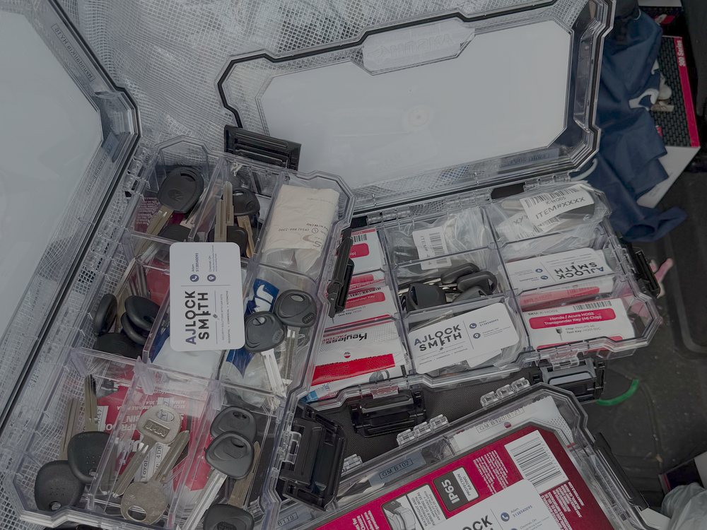 Transponder key blanks and remote fobs carried in the AJ Locksmith van