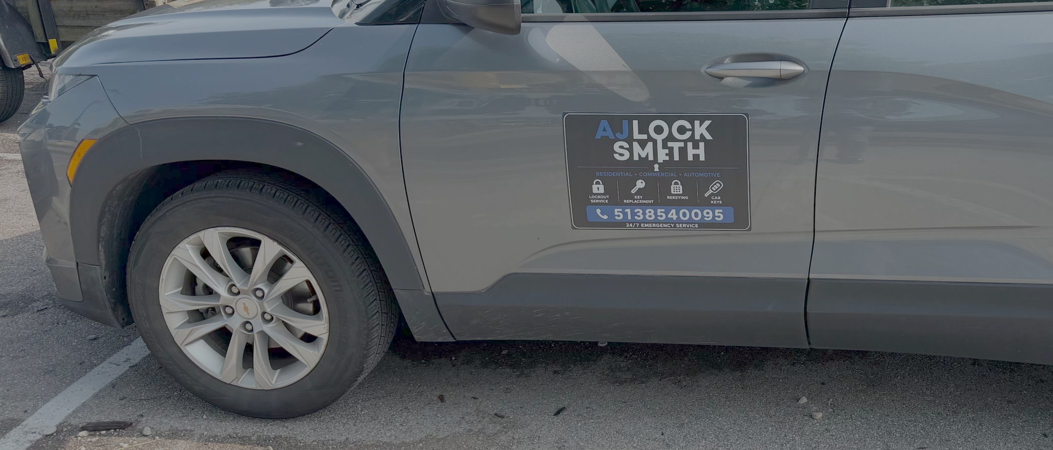 The AJ Locksmith mobile service vehicle on a job in the Cincinnati area
